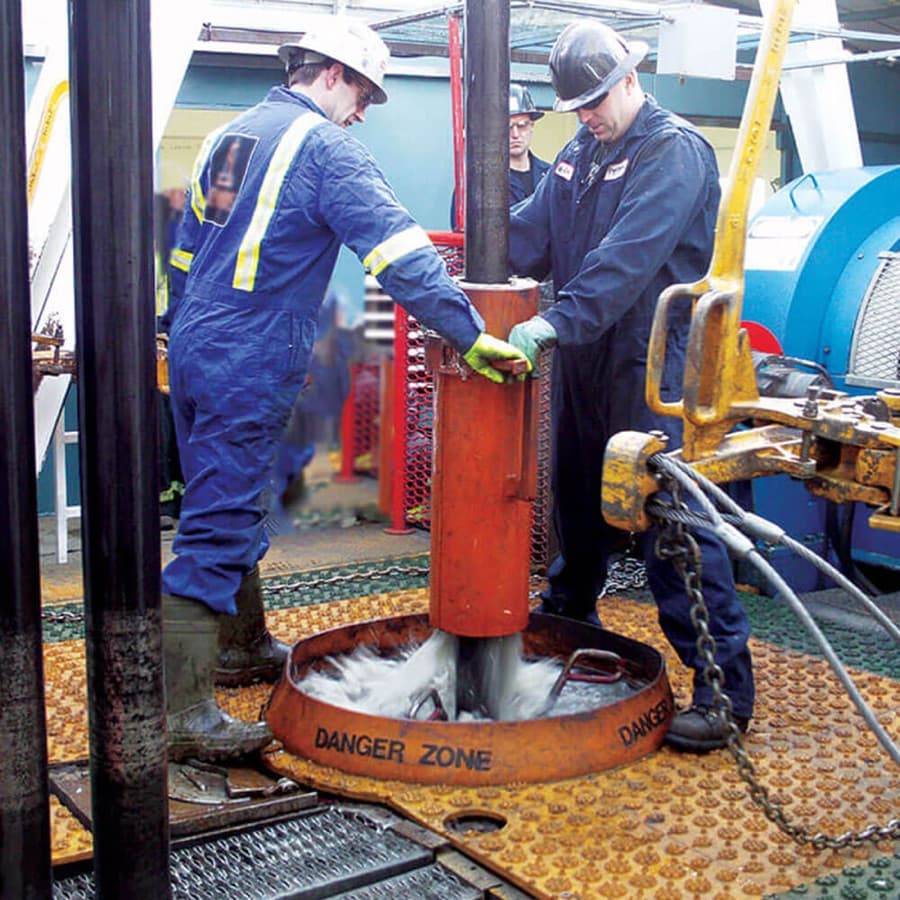 Rig safety and containment system installed on a drilling rig