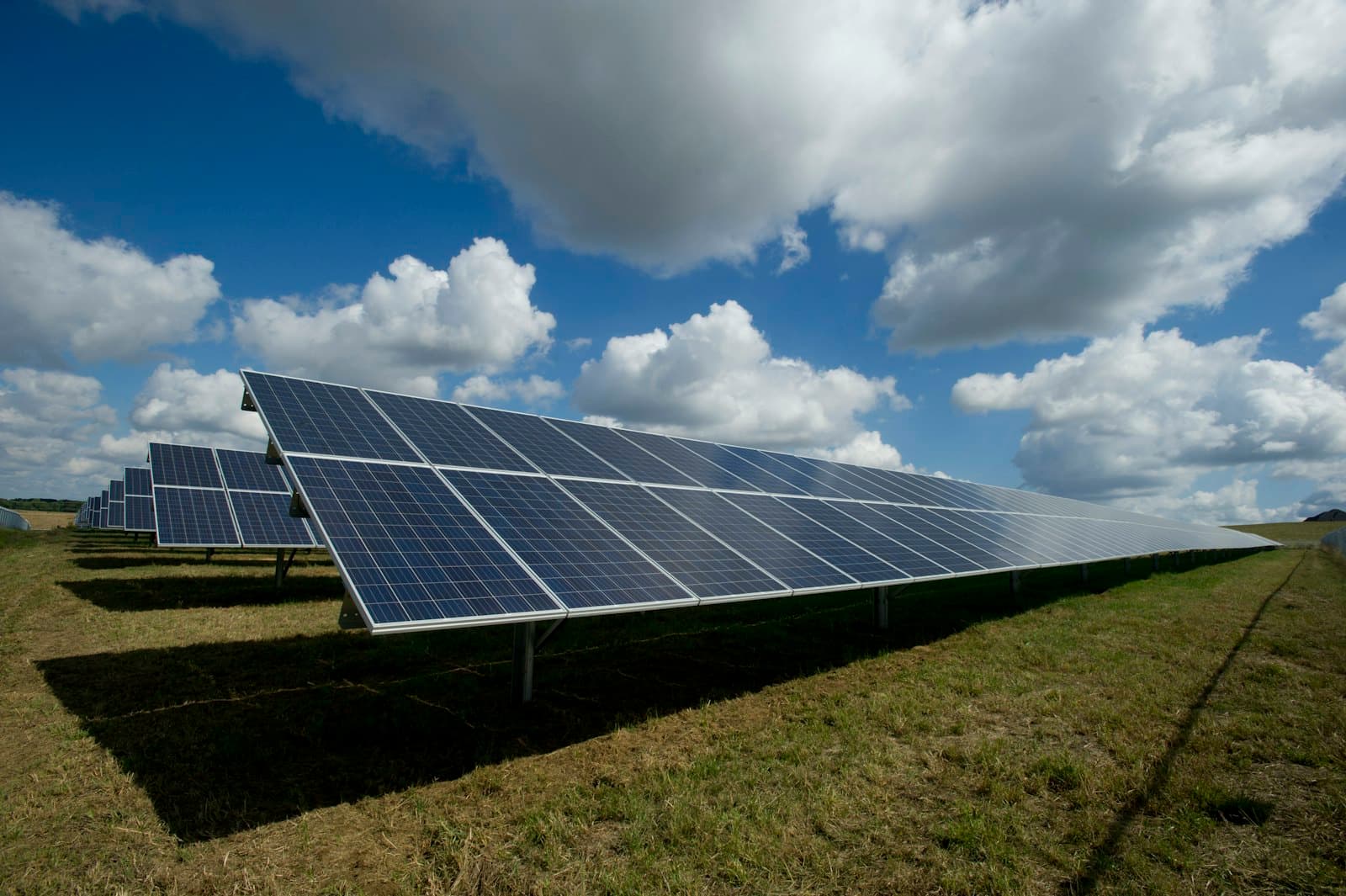Solar photovoltaic panels installed under a clear sky